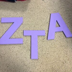 purple zta letters